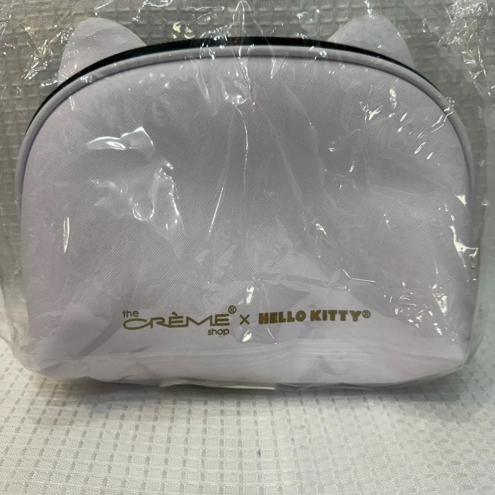 Hello Kitty and The Cream shop White Dome makeup travel pouch with Red Bow
